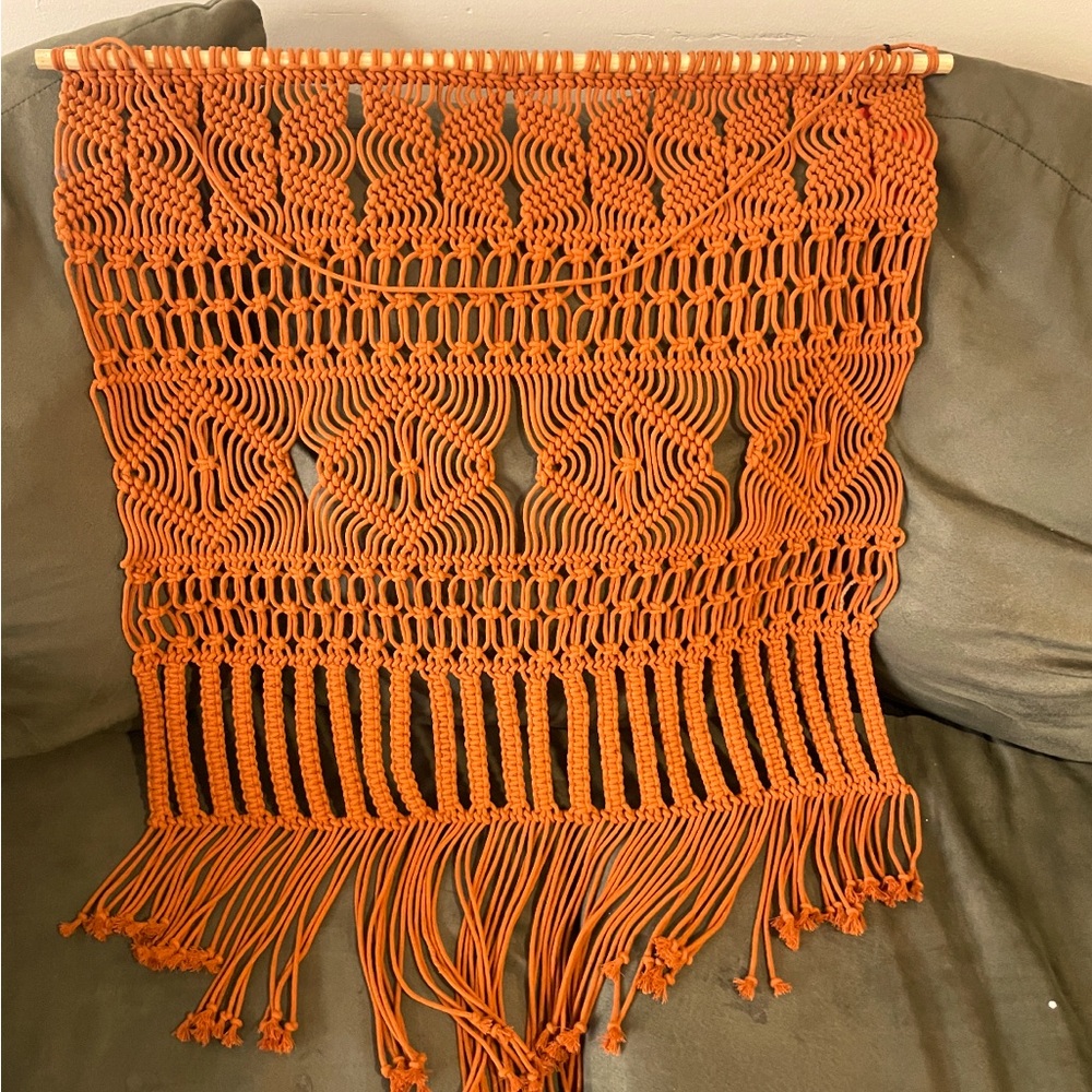 Orange woven wall hanging decoration